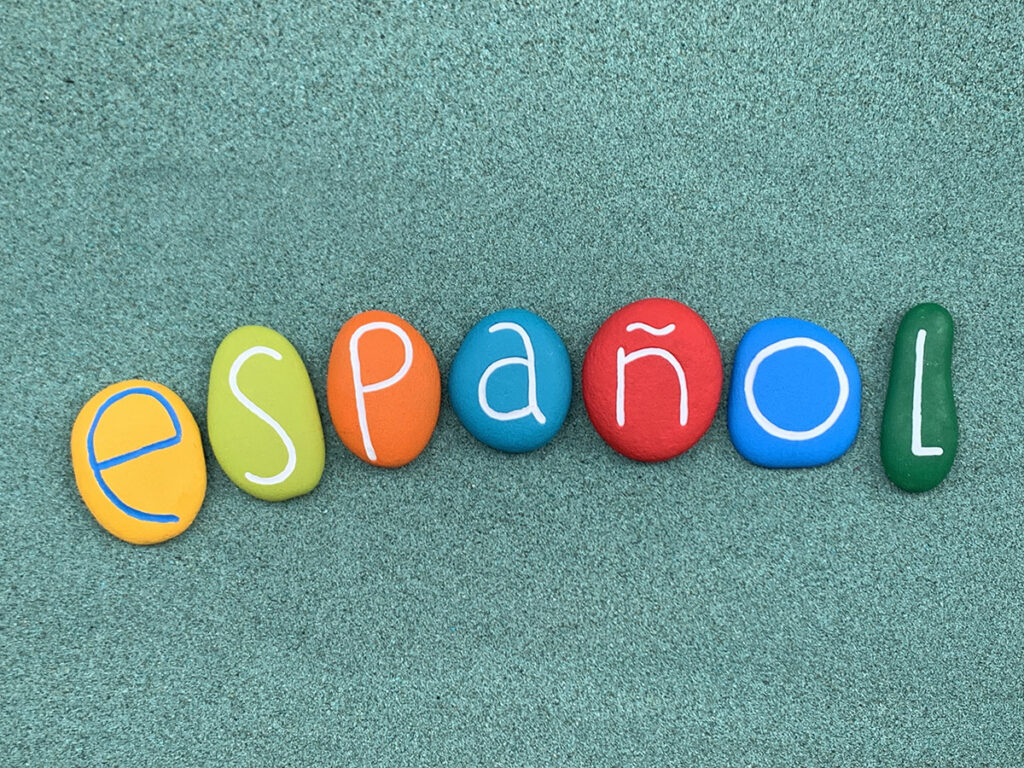 The word espanol made with stone art for ad astra