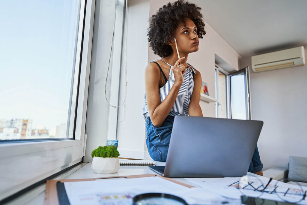 An Ad Astra interpreter sits on her desk and thinks about trainings