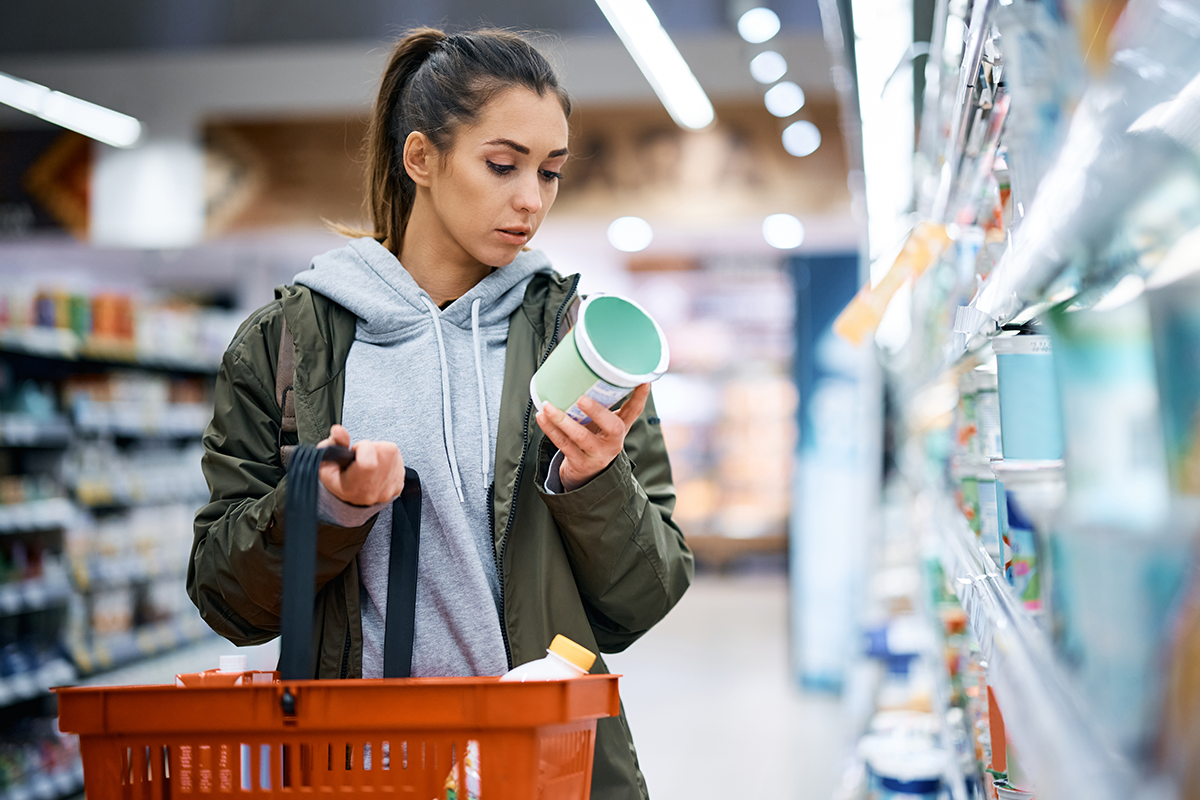 A woman checks the quality of the Canadian Food Labeling product